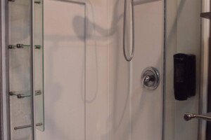 Clean private shower at California Dreams Hostel in San Diego